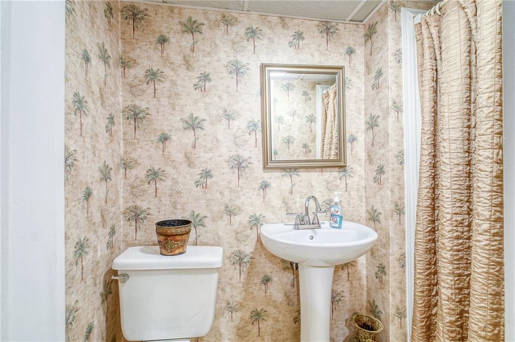 577 Hillcrest Avenue McKees Rocks, PA 15136 - Photo 22 of 23 a bathroom with a sink and a mirror