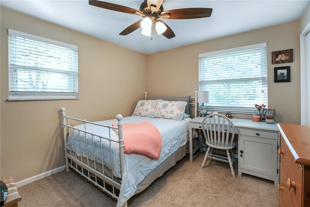 171 Mary Reed Road Baden, PA 15005 - Photo 11 of 25 a bedroom with a bed and a desk