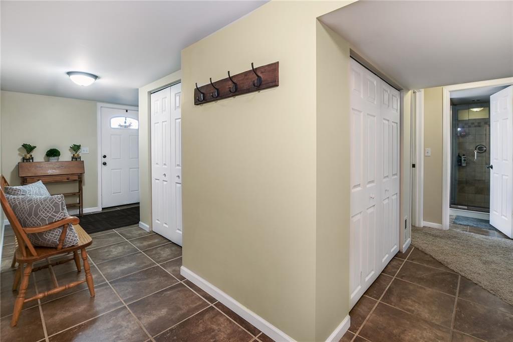 171 Mary Reed Road Baden, PA 15005 - Photo 16 of 25 a view of a hallway and chairs in a room