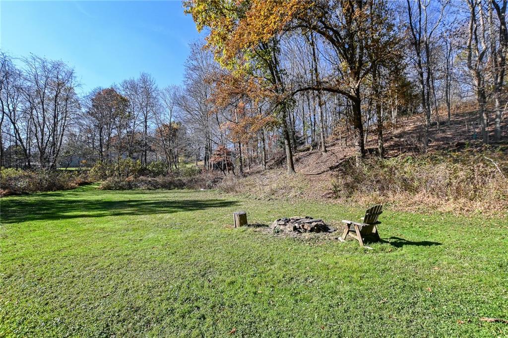 171 Mary Reed Road Baden, PA 15005 - Photo 17 of 25 a backyard of a house with lots of green space