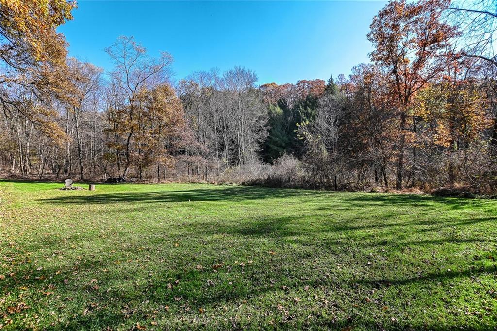 171 Mary Reed Road Baden, PA 15005 - Photo 18 of 25 a view of a field of grass and trees