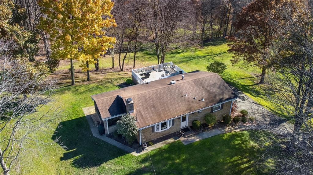 171 Mary Reed Road Baden, PA 15005 - Photo 2 of 25 a view of a garden with wooden fence