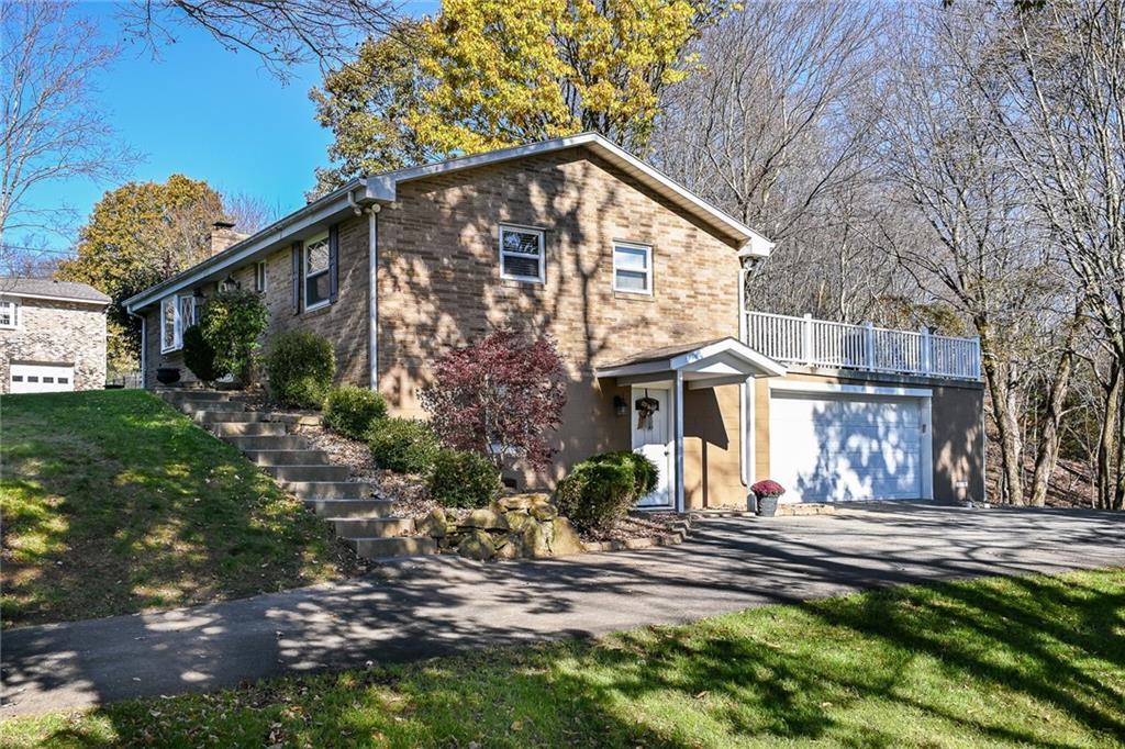 171 Mary Reed Road Baden, PA 15005 - Photo 21 of 25 a front view of a house with a yard