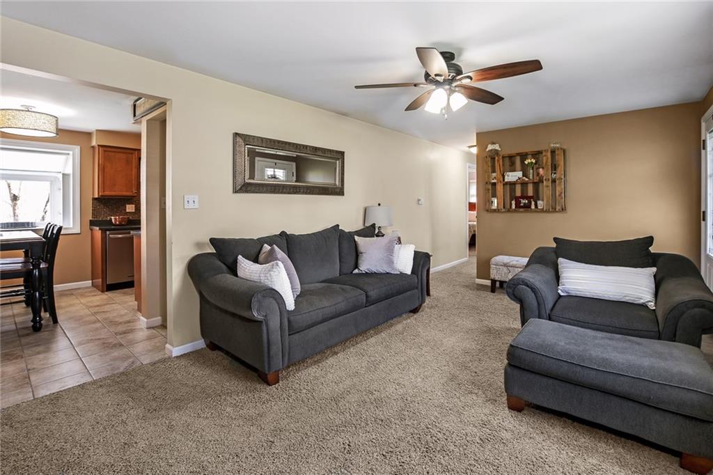 171 Mary Reed Road Baden, PA 15005 - Photo 4 of 25 a living room with furniture and a ceiling fan