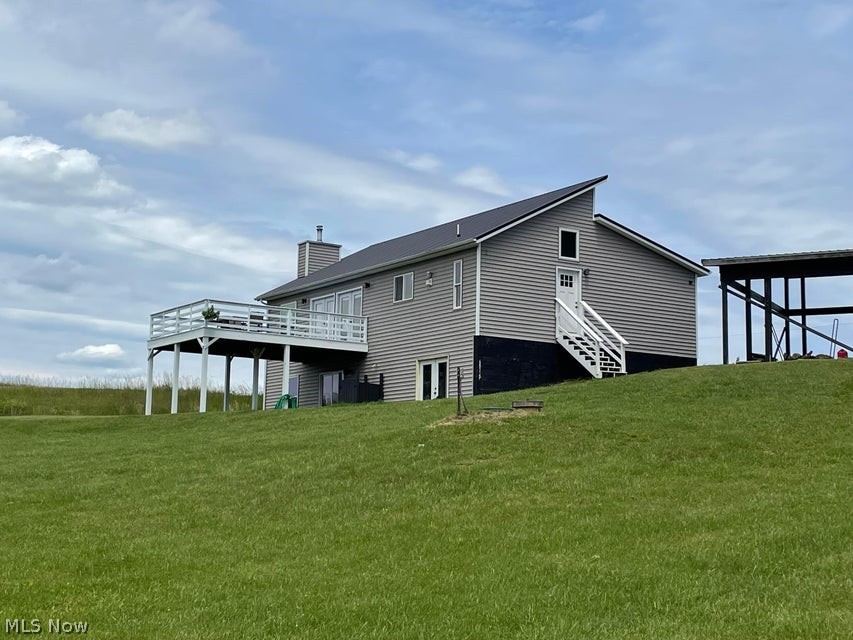 15393 Shade Road Guysville, OH 45735 - Photo 31 of 35 Contemporary-style residence with light gray siding and a dark gray roof