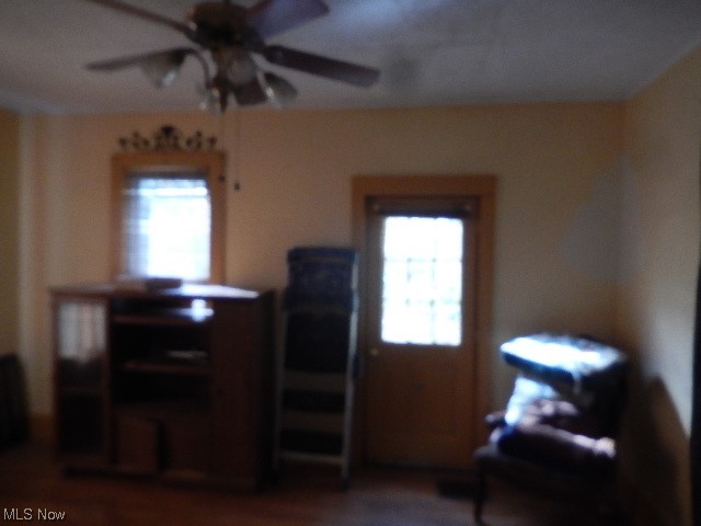1302 Duncan Street Southwest Massillon, OH 44647 - Photo 6 of 22 Living area with ceiling fan