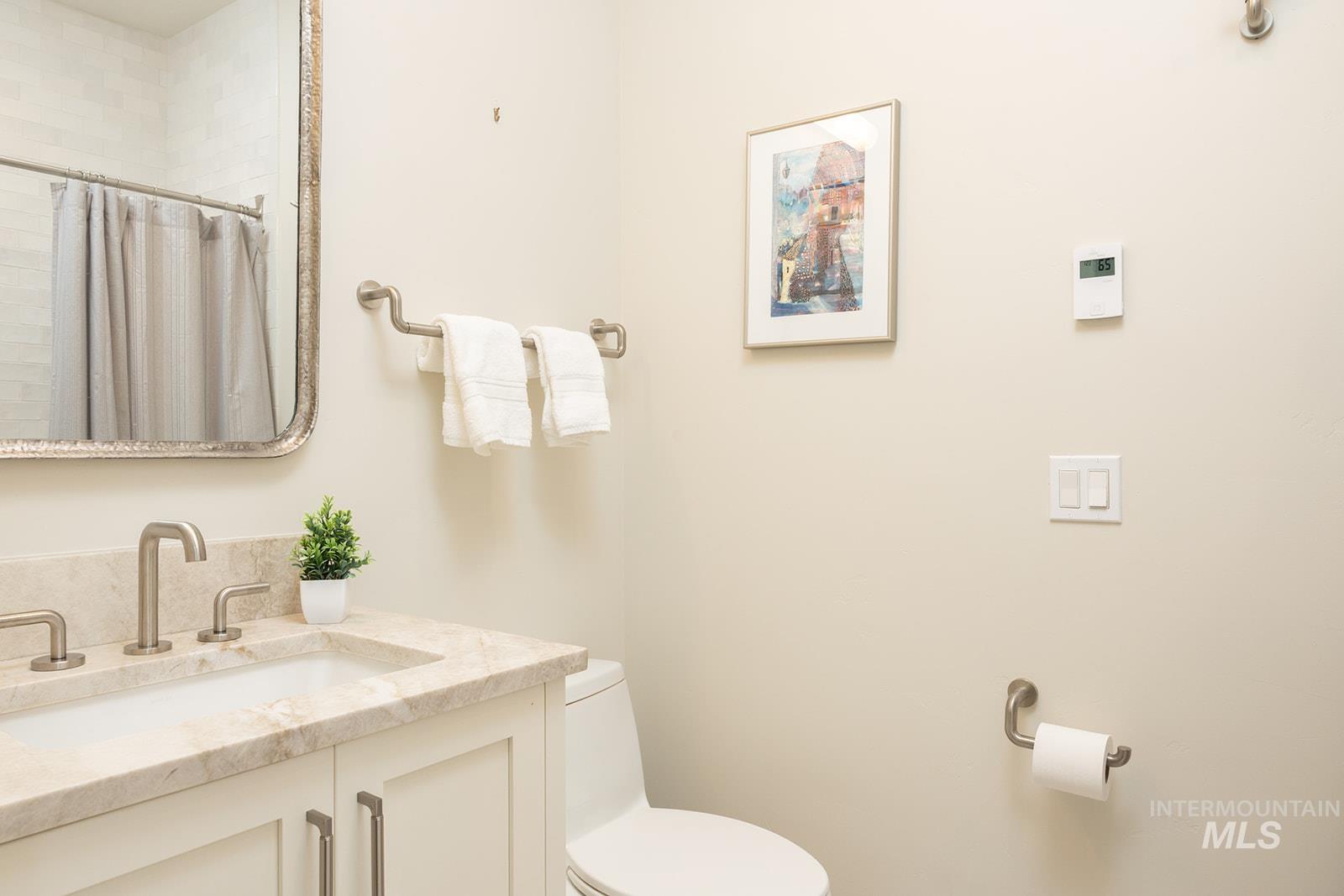 27 Streamside Drive Hailey, ID 83333 - Photo 26 of 39 Full bath with vanity and a tile shower