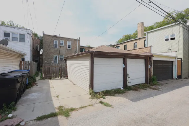 a view of a house with a garage