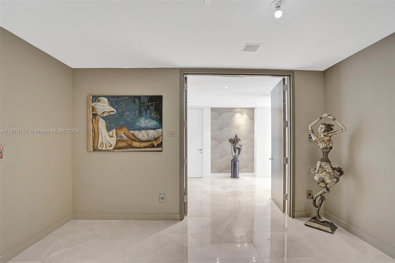 18975 Collins Avenue, Unit 2001 Sunny Isles Beach, FL 33160 - Photo 57 of 86 PRIVATE FOYER OF THE UNIT