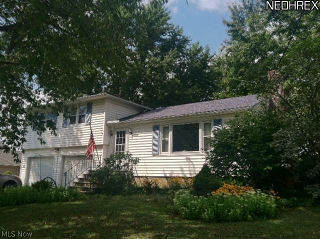 2031 West River Road South Elyria, OH 44035 - Photo 1 of 1 Attractive split level on .46 acre lot with 2 car attached garge and rear deck