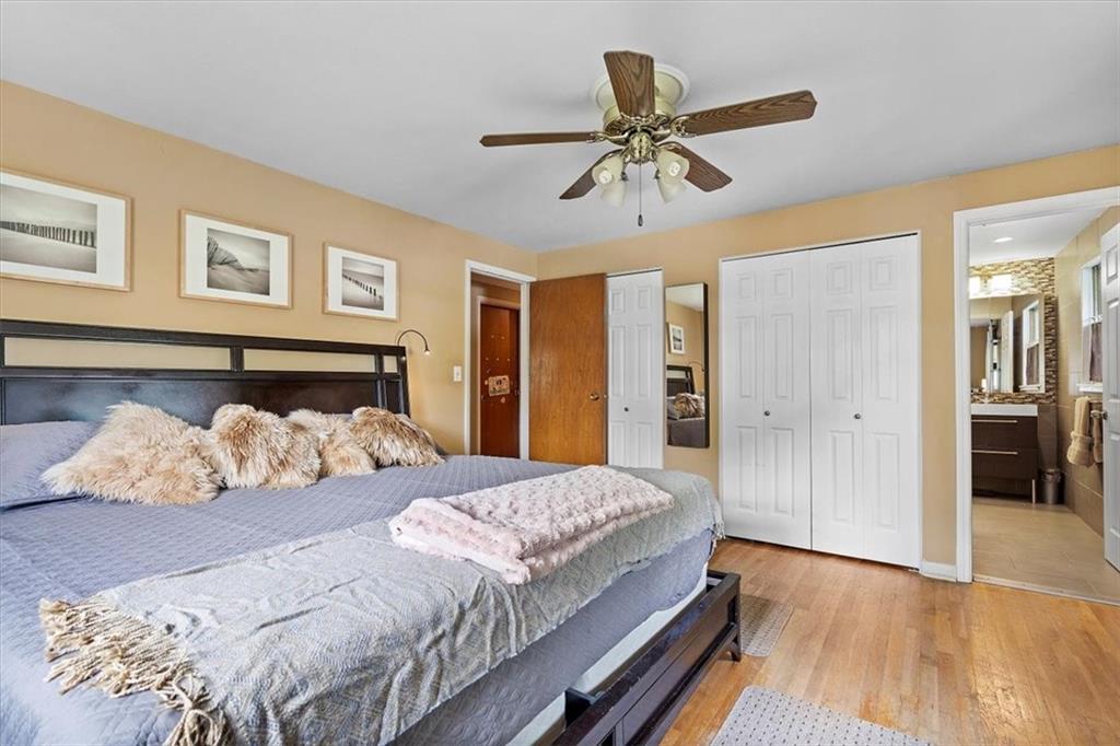 108 South Jamestown Road Coraopolis, PA 15108 - Photo 14 of 25 a bedroom with a bed and a chandelier