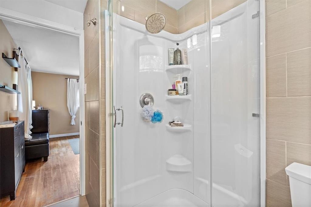 108 South Jamestown Road Coraopolis, PA 15108 - Photo 16 of 25 a bathroom with a shower a sink and a mirror with toilet