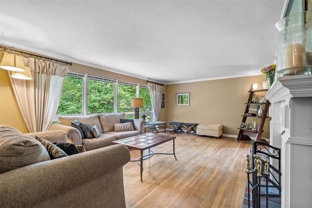 108 South Jamestown Road Coraopolis, PA 15108 - Photo 3 of 25 a living room with furniture and a large window