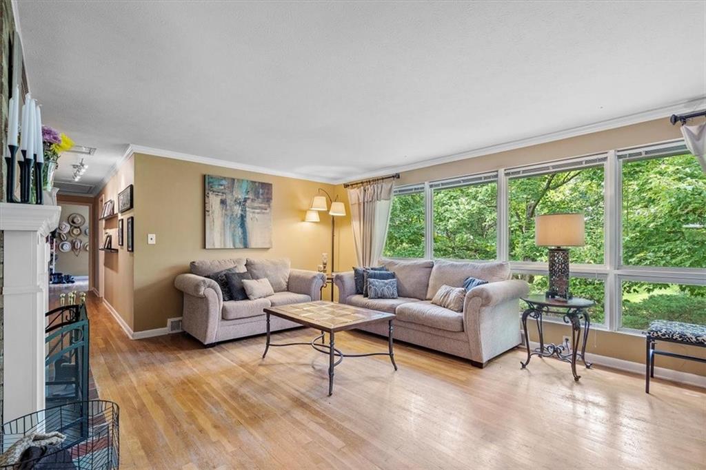 108 South Jamestown Road Coraopolis, PA 15108 - Photo 4 of 25 a living room with furniture and a large window