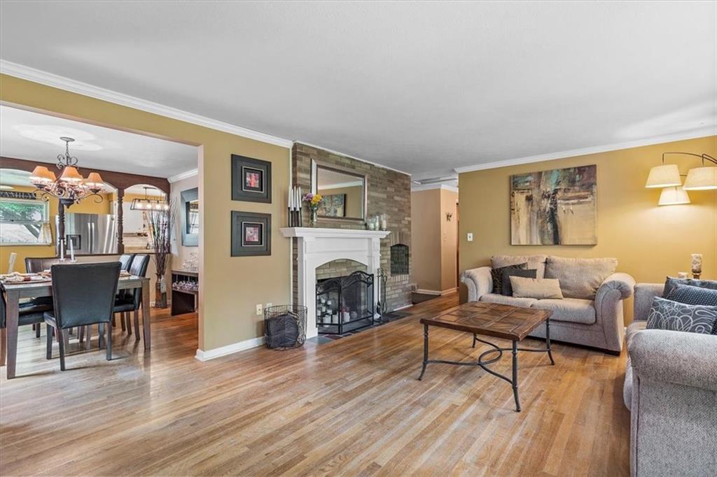 108 South Jamestown Road Coraopolis, PA 15108 - Photo 6 of 25 a living room with furniture and a fireplace