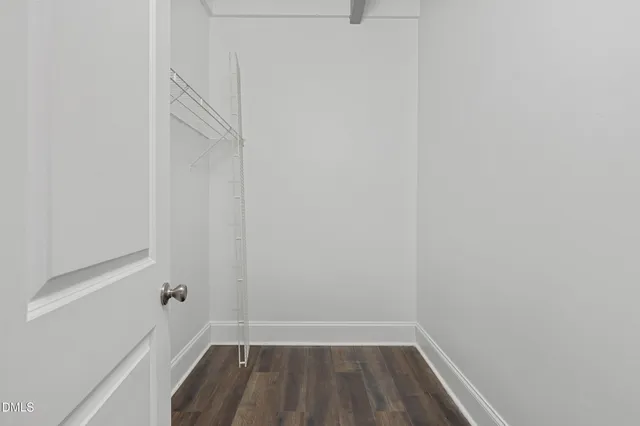 a view of small space with racks on the wall