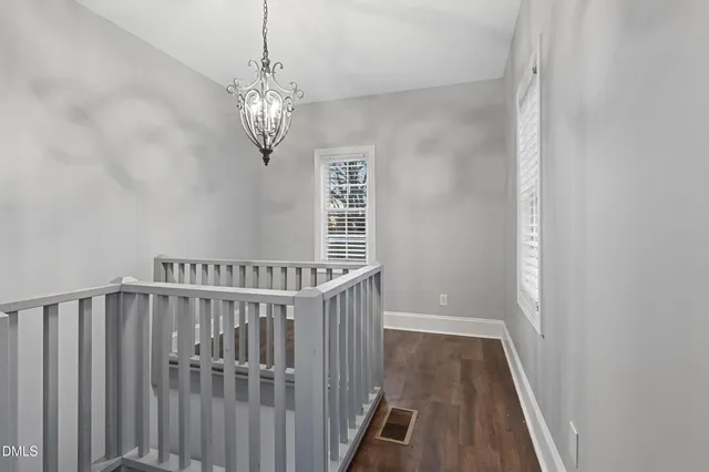 a view of entryway with wooden floor