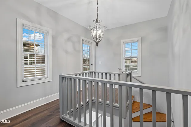 a view of entryway with wooden floor