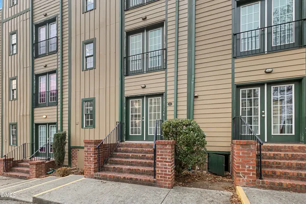 a view of a building with a window and stairs