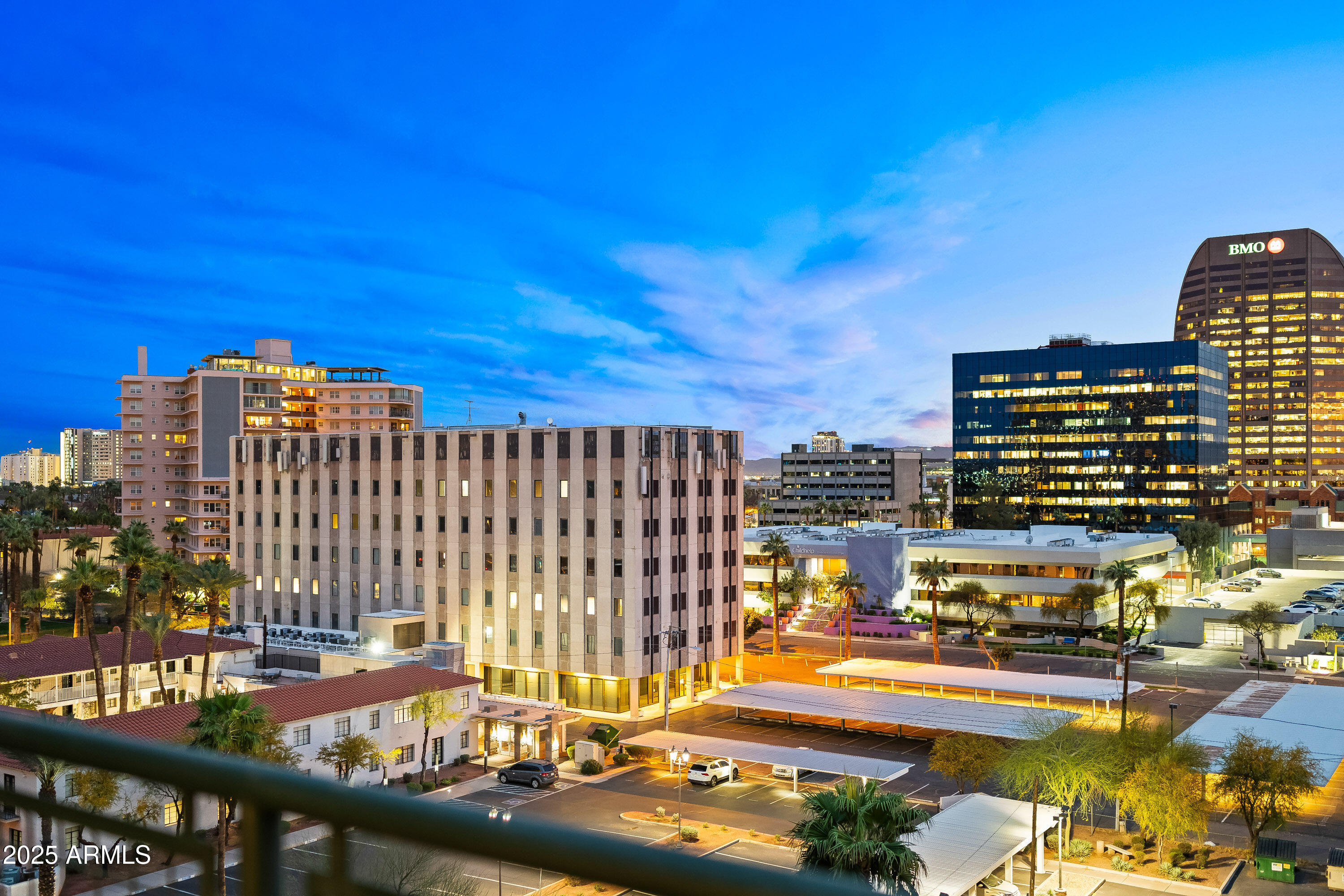 a view of a city with tall buildings