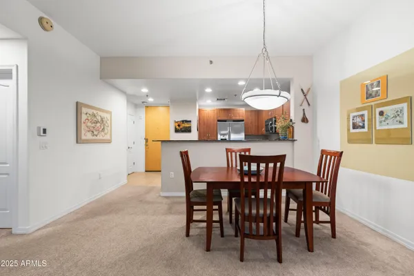 a view of a dining room and livingroom