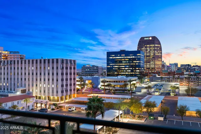 a view of swimming pool from a balcony