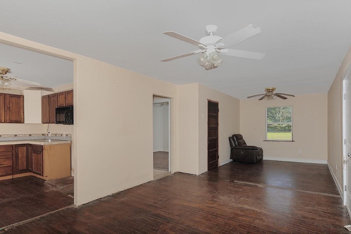 1231 Pruitt Road Spring, TX 77380 - Photo 12 of 37 a view of livingroom with furniture and chandelier fan