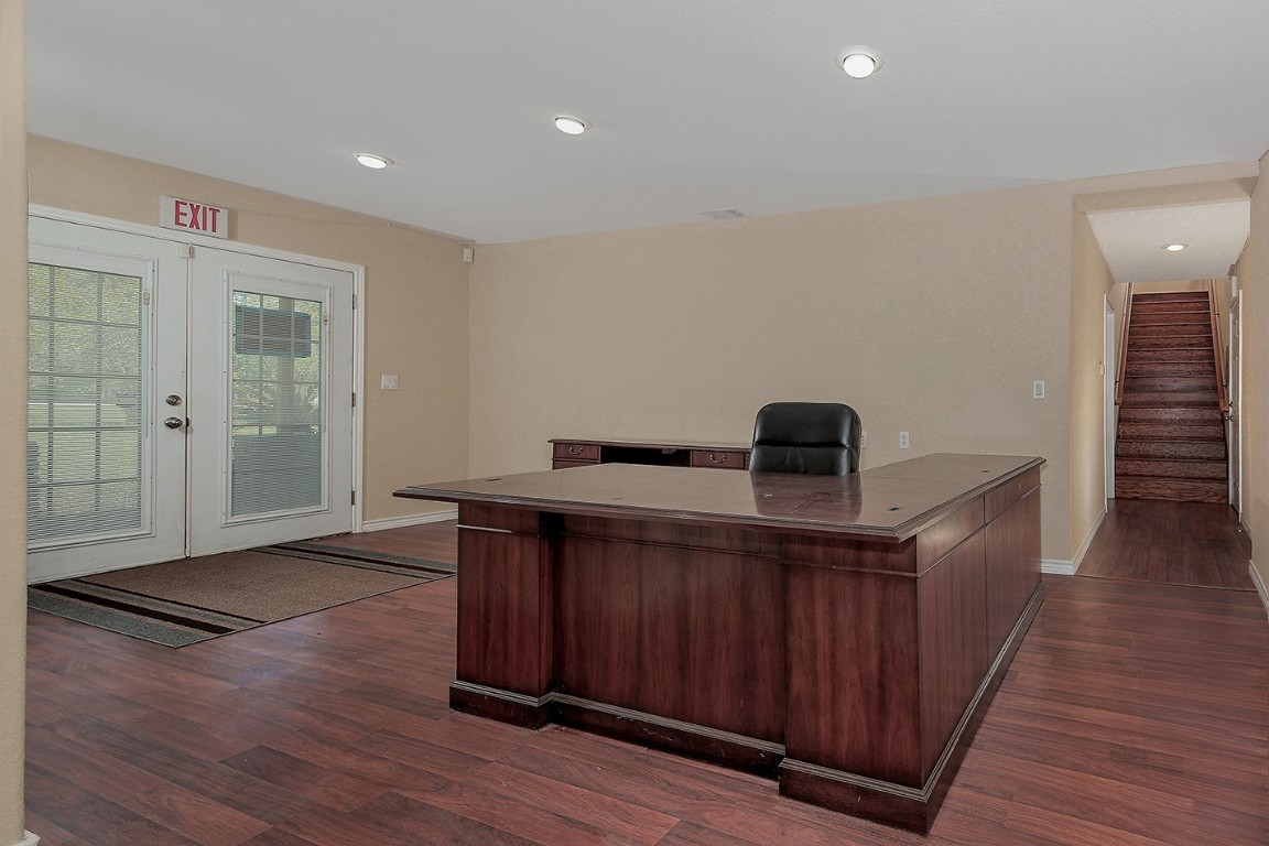 1231 Pruitt Road Spring, TX 77380 - Photo 15 of 37 a view of a hallway with wooden floor