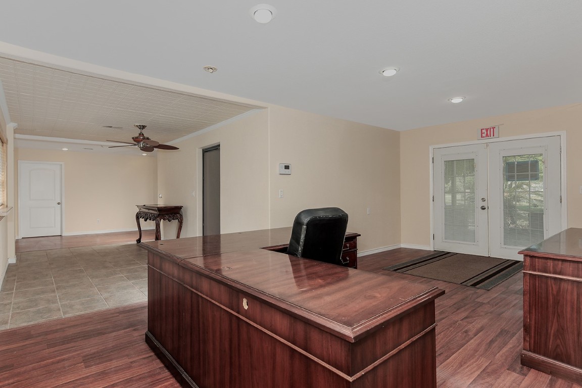 1231 Pruitt Road Spring, TX 77380 - Photo 16 of 37 a living room with a table and chairs