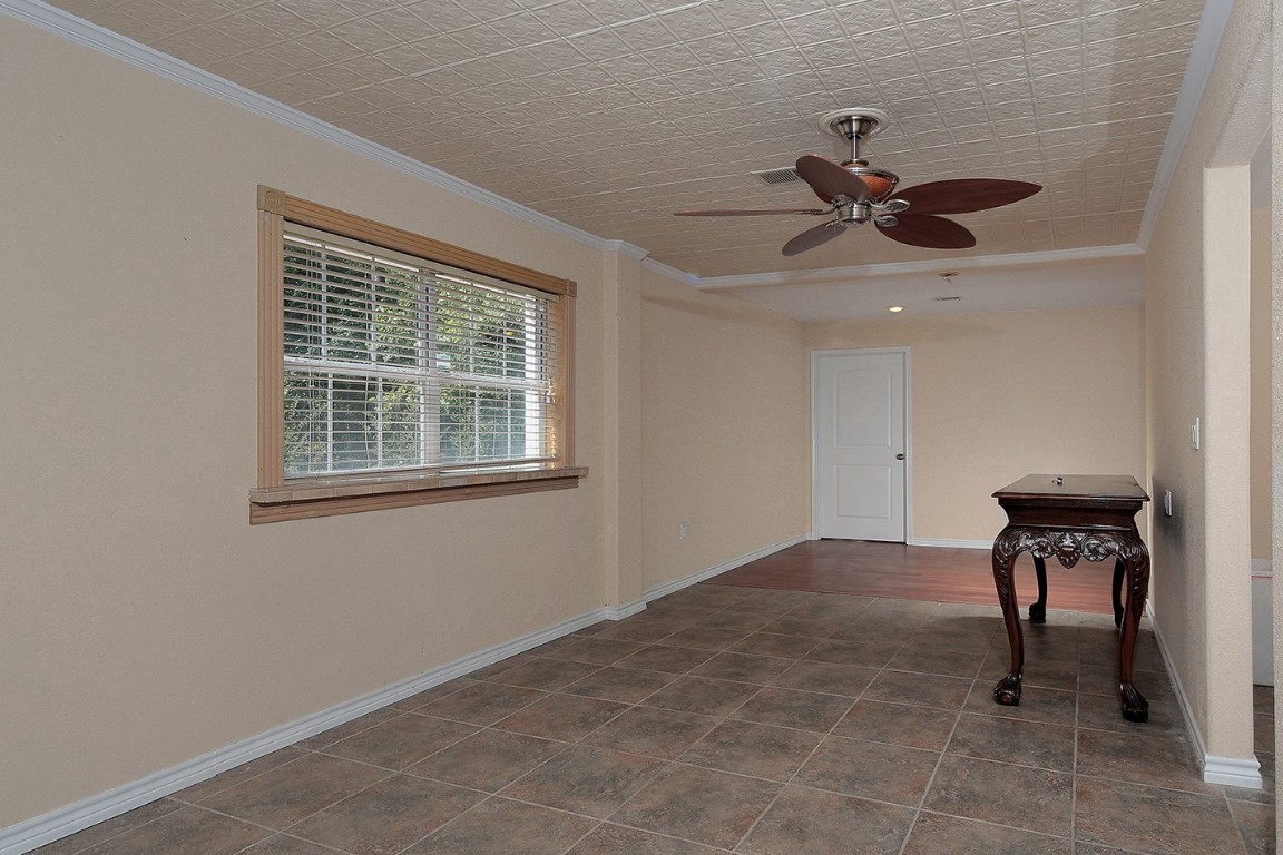 1231 Pruitt Road Spring, TX 77380 - Photo 17 of 37 a view of an empty room with a window