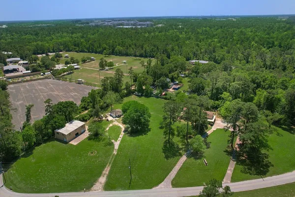 a view of a lake with a yard