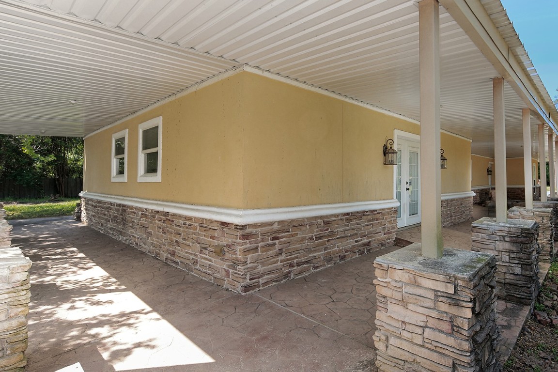 1231 Pruitt Road Spring, TX 77380 - Photo 4 of 37 a view of house with backyard
