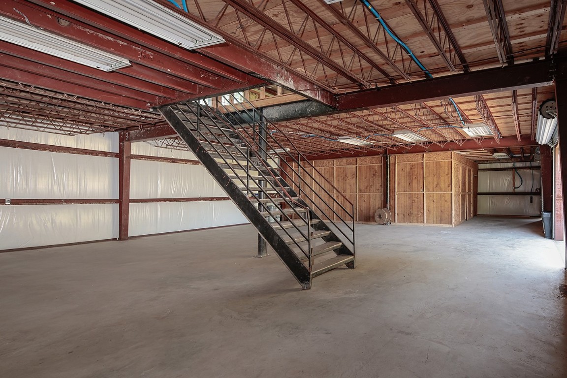 1231 Pruitt Road Spring, TX 77380 - Photo 7 of 37 a view of an empty room with a garage
