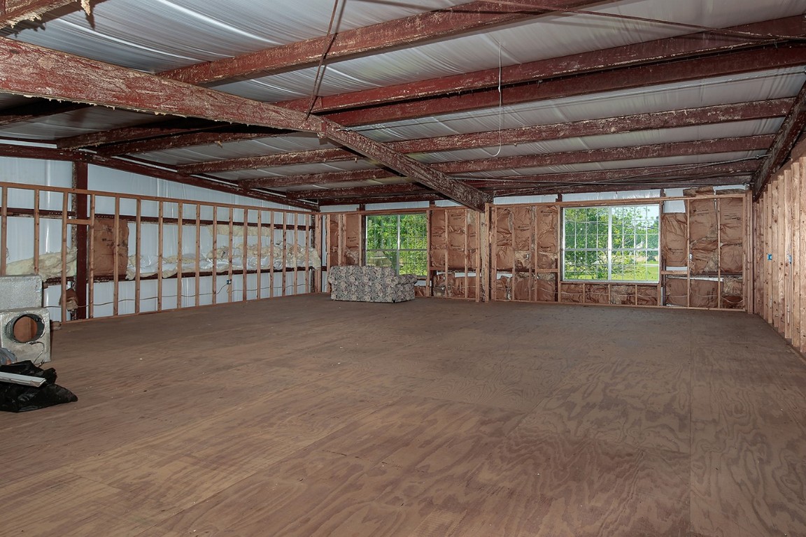1231 Pruitt Road Spring, TX 77380 - Photo 8 of 37 a view of an empty room with a window