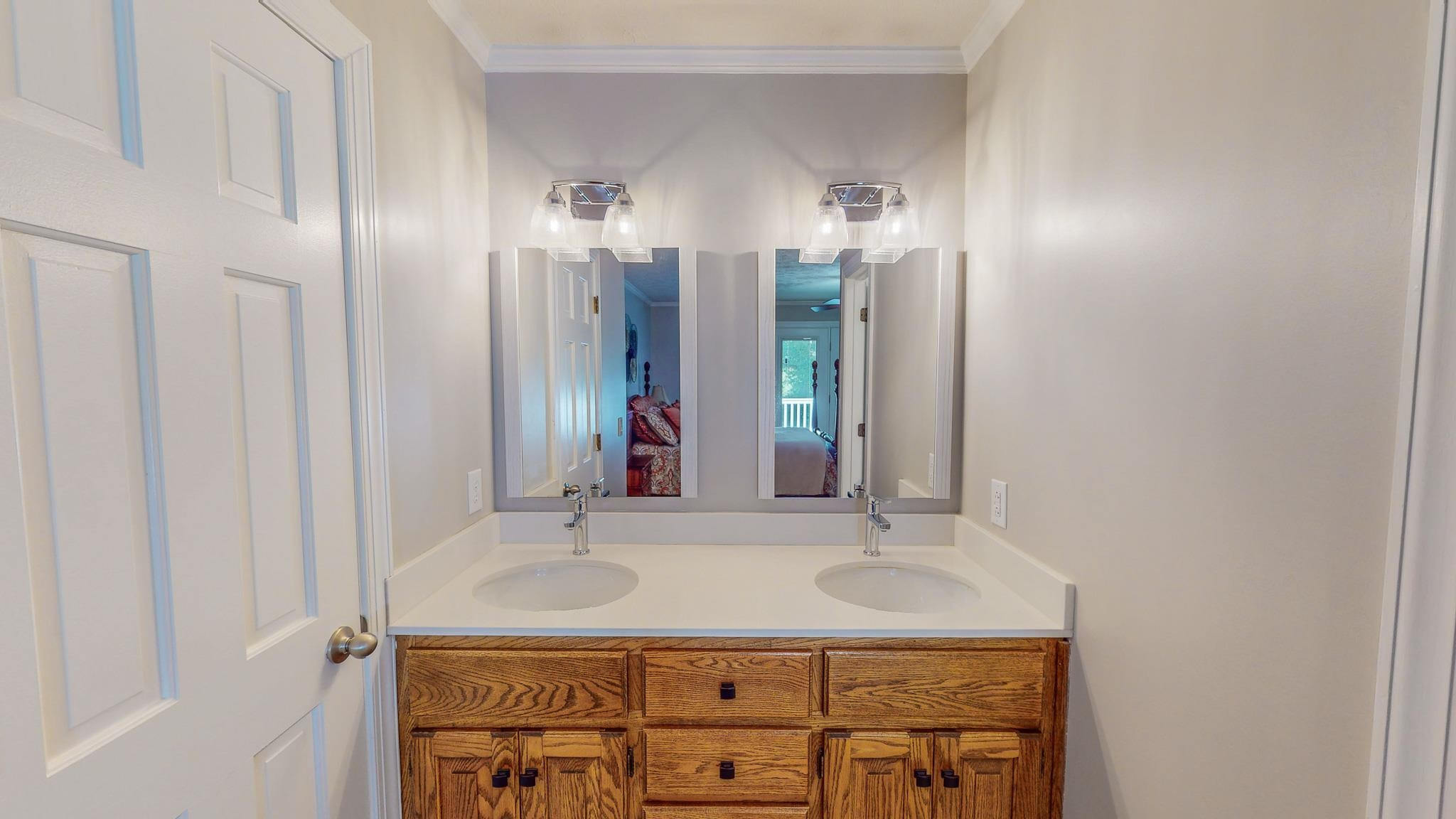 415 North Ridge Circle Roxboro, NC 27574 - Photo 31 of 59 a bathroom with a sink and a mirror