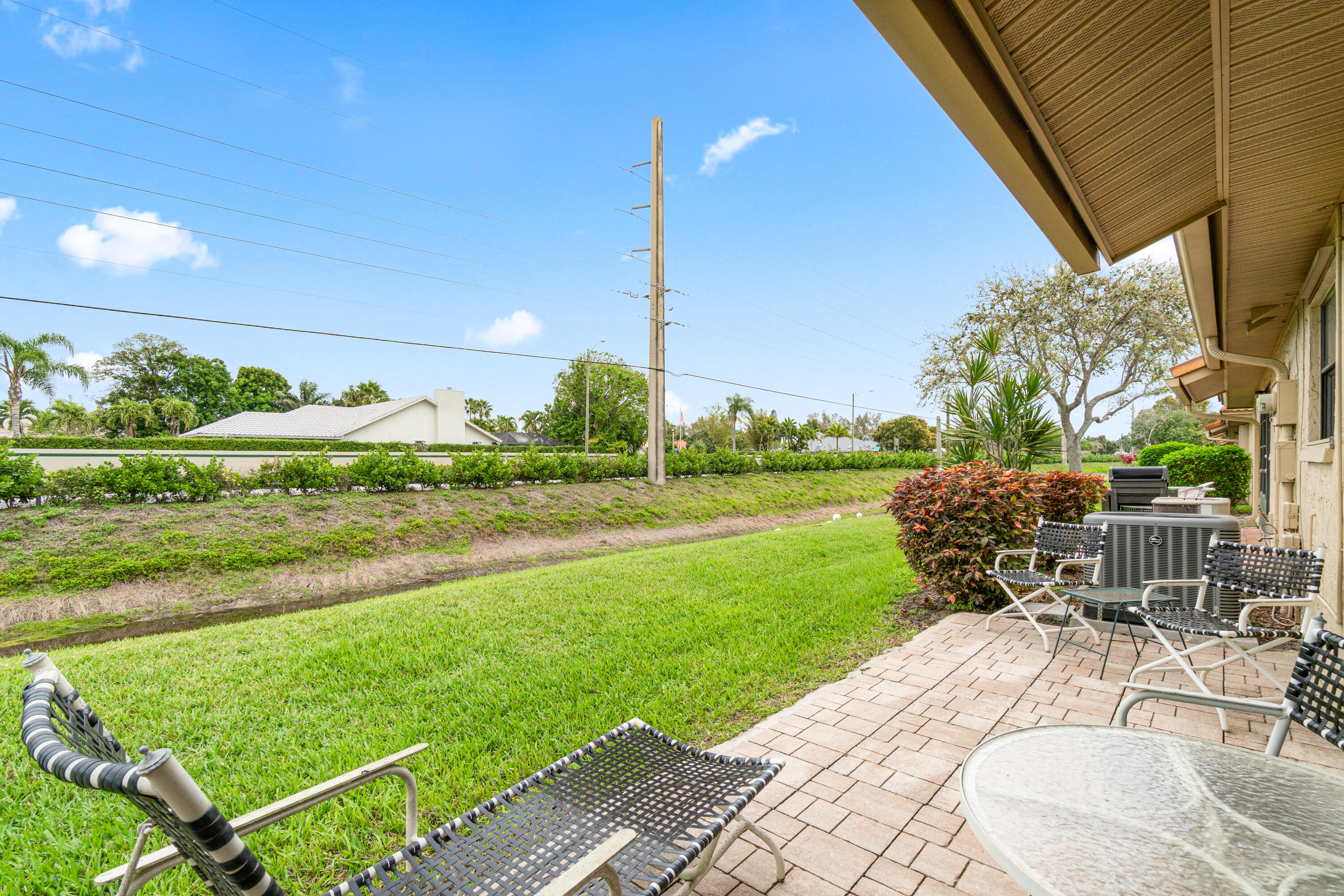4525 Pandanus Tree Road, Unit A Boynton Beach, FL 33436 - Photo 24 of 28 BACK OF VILLA