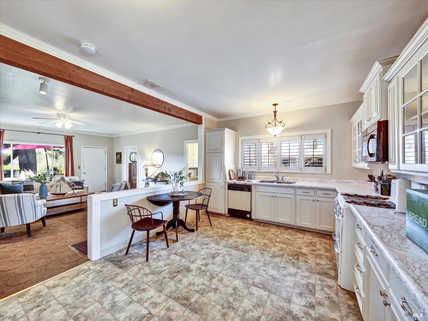 2060 Hagen Road Napa, CA 94558 - Photo 18 of 56 a view of a kitchen and dining room