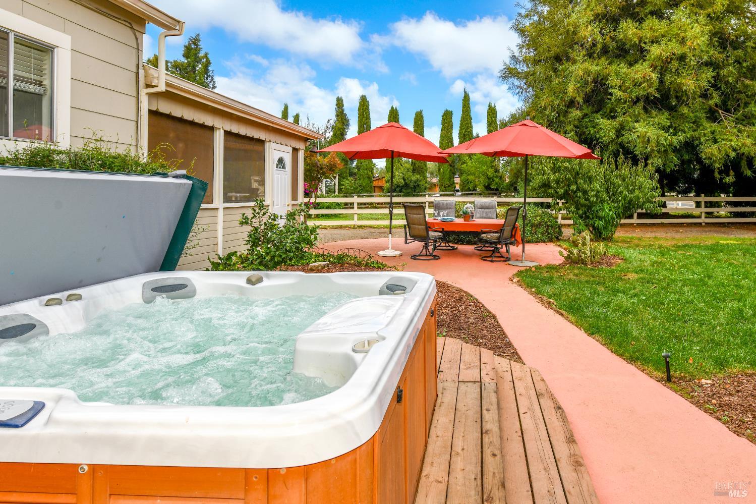 2060 Hagen Road Napa, CA 94558 - Photo 29 of 56 a view of a backyard with a patio and fire pit