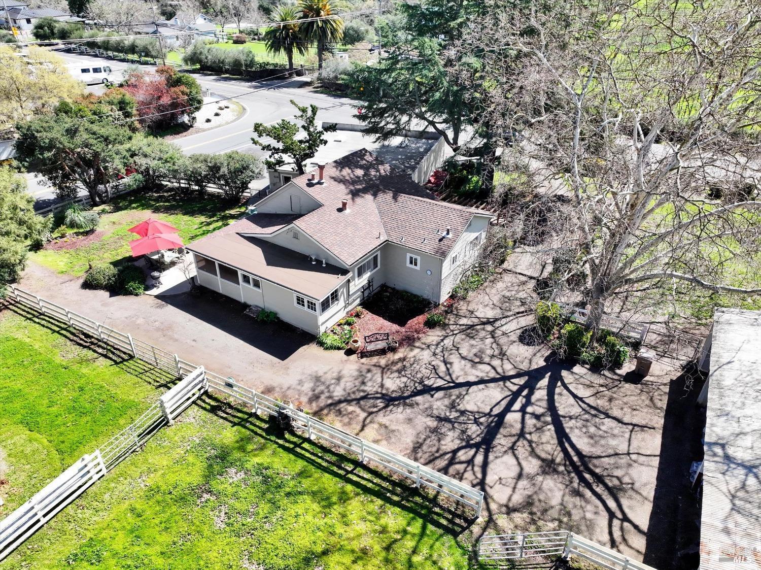 2060 Hagen Road Napa, CA 94558 - Photo 50 of 56 an aerial view of a house with a yard and garden