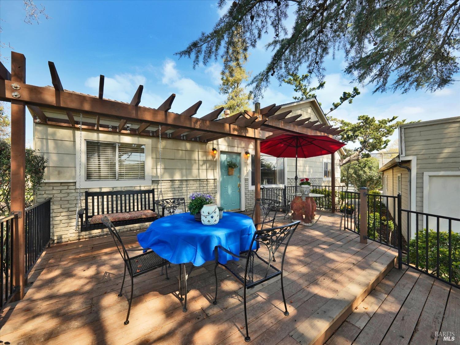 2060 Hagen Road Napa, CA 94558 - Photo 5 of 56 a view of a chairs and table in patio with a fire pit