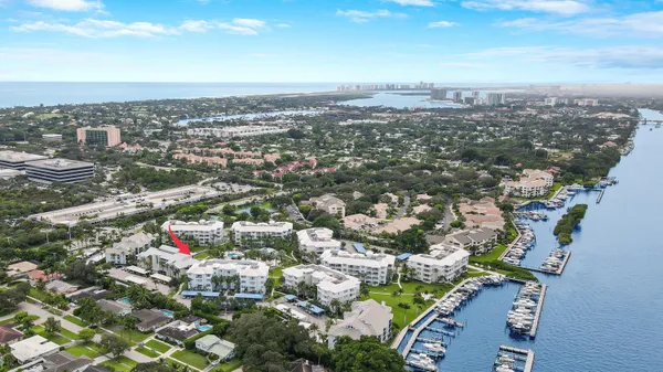 an aerial view of city and lake