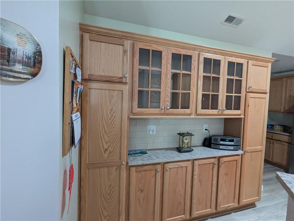 3204 Tudor Drive Butler, PA 16001 - Photo 12 of 35 a kitchen with stainless steel appliances granite countertop a refrigerator and a sink
