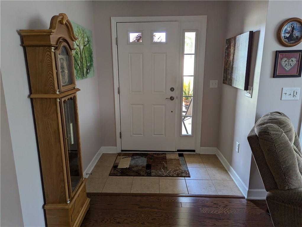 3204 Tudor Drive Butler, PA 16001 - Photo 5 of 35 a view of a hallway with wooden floor