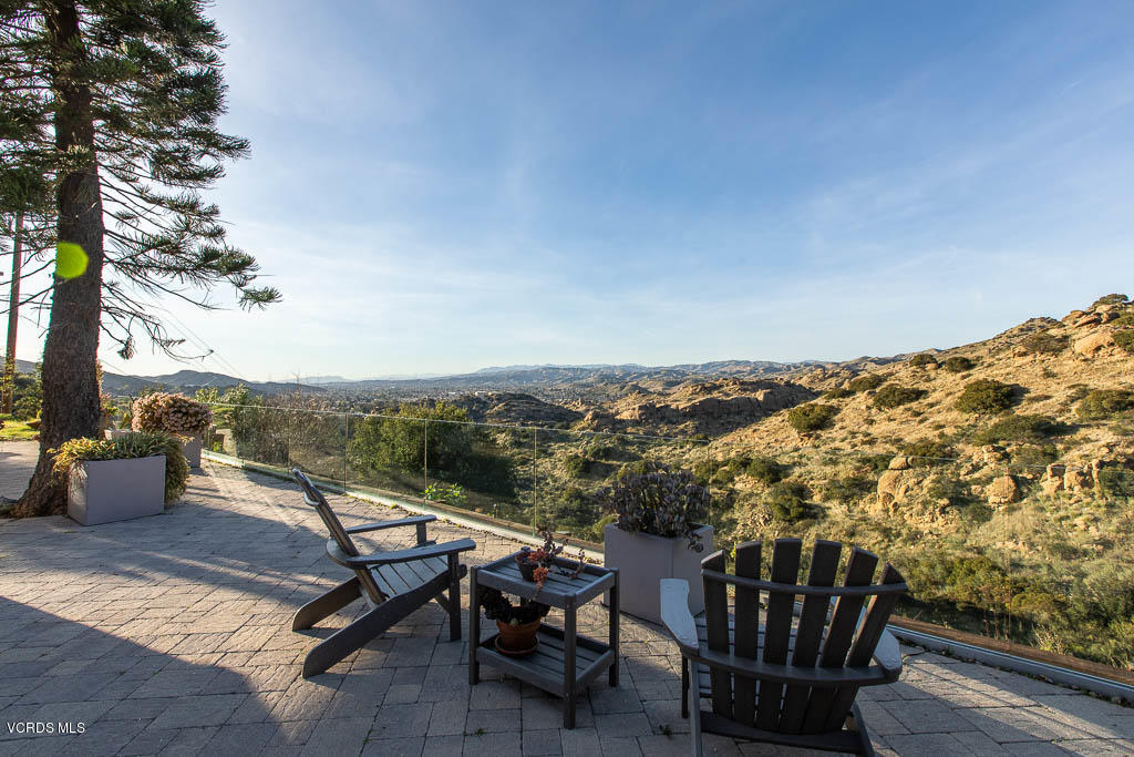 7199 Santa Susana Pass Road Simi Valley, CA 93063 - Photo 14 of 62 a view of a chairs and table in patio