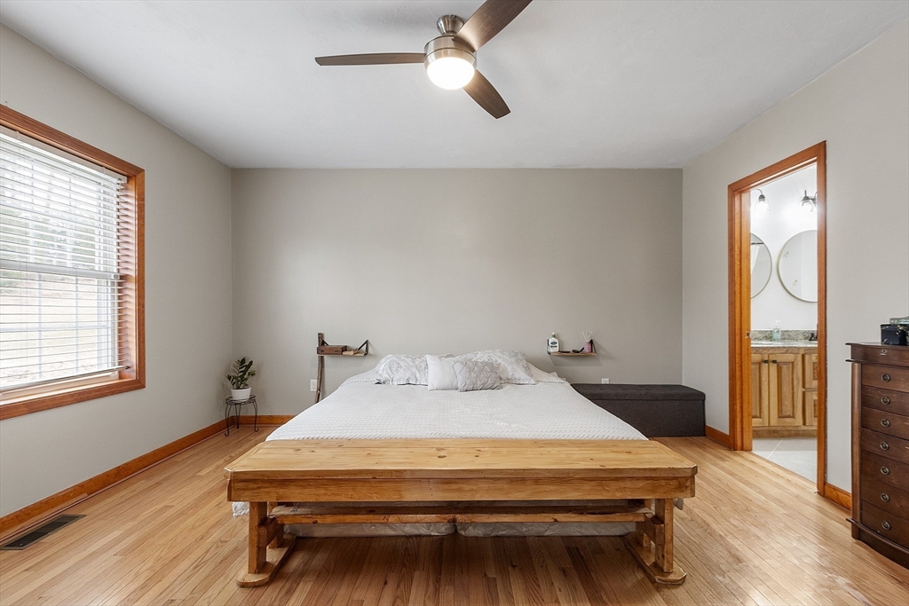 1 Gary Road Templeton, MA 01468 - Photo 18 of 33 a bedroom with a bed table and window