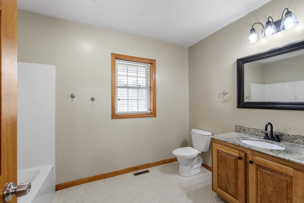 1 Gary Road Templeton, MA 01468 - Photo 28 of 33 a bathroom with a toilet sink and mirror