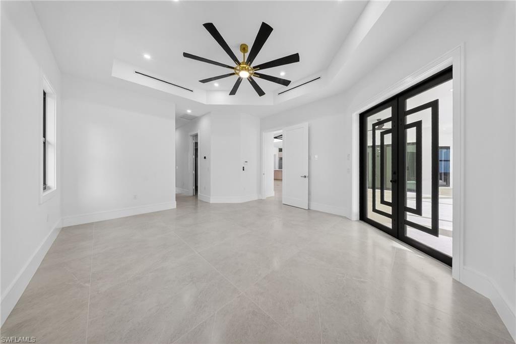 522 17th Street Southwest Naples, FL 34117 - Photo 11 of 50 a view of a livingroom with a ceiling fan and window