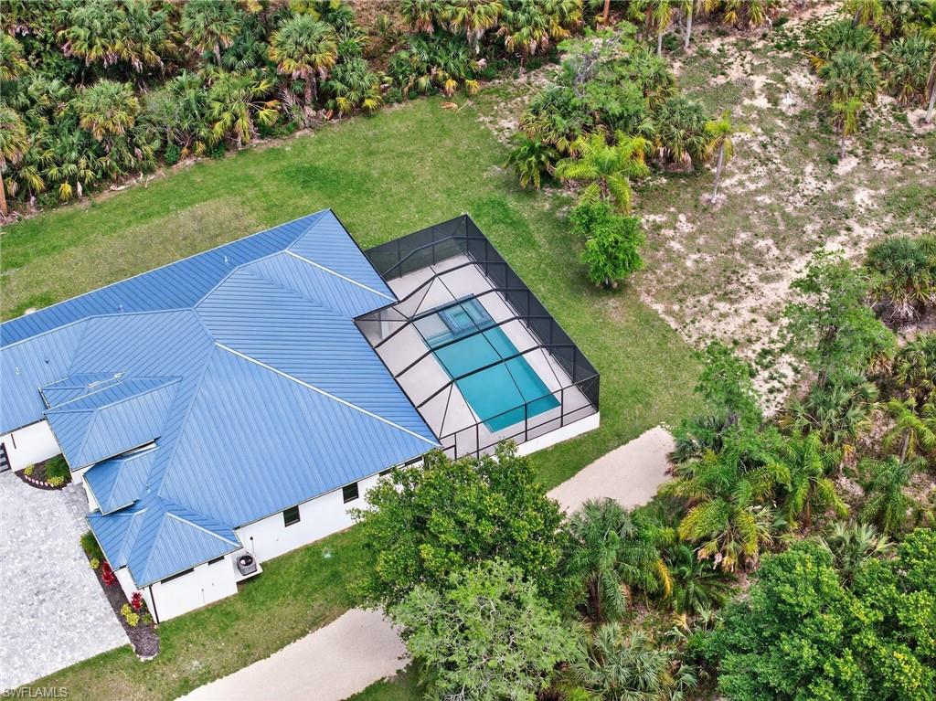 522 17th Street Southwest Naples, FL 34117 - Photo 48 of 50 a view of a backyard with plants
