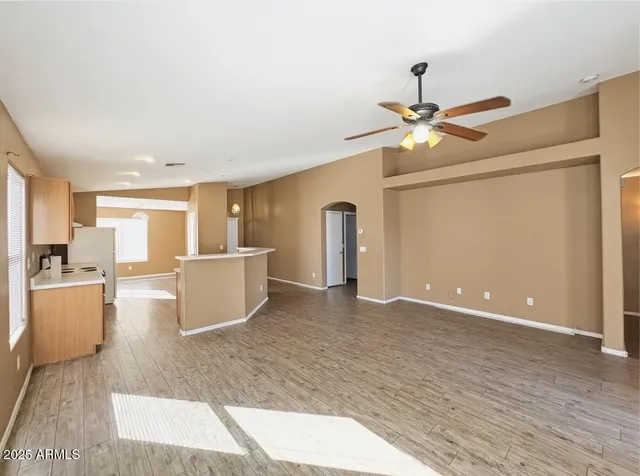 a view of a kitchen with a sink and a window