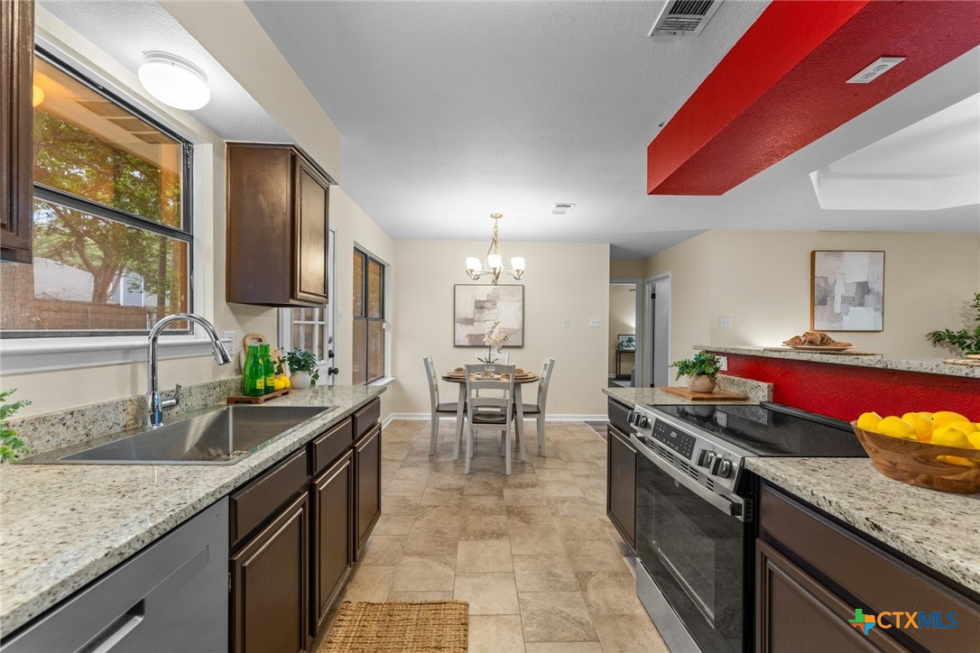 2504 Lazy Ridge Drive Killeen, TX 76543 - Photo 13 of 27 a kitchen with granite countertop lots of counter top space